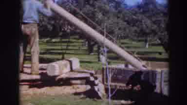 Sacramento California (1937): Two Male Engineers Outdoors Lifting A Filled Pipe