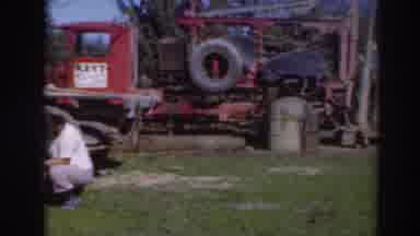 Sacramento California (1937): Men Work With Machinery On A Bright Sunny Day