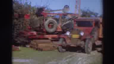 Sacramento California (1937): View Of Vintage Red Truck And Yellow Crane On A