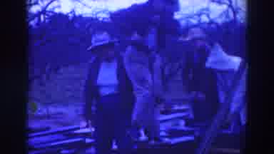 Sacramento California (1937): People Stand Around Pit While Single Man Digs