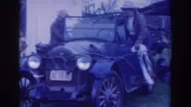 Sacramento California (1937): Two Men Standing On A Car One Of Them Wipes The