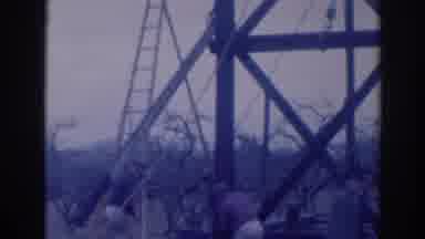 Sacramento California (1937): People Supporting A Ladder In A Building And Man