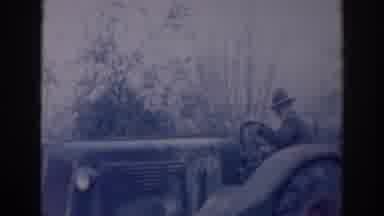 Sacramento California (1937): Older Man Starts And Drives Antique Tractor