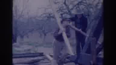 Sacramento California (1937): Older Men Are Lifting Objects Outside And Working