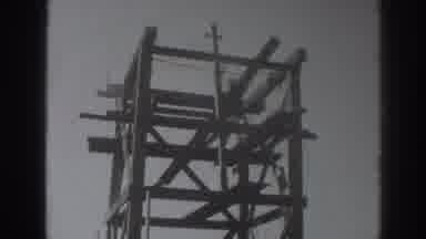 Sacramento California (1937): Person Placing Two By Four On Top Of Tower On A