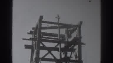 Sacramento California (1937): Worker Climbs High To Help Assemble An Oil Rig As