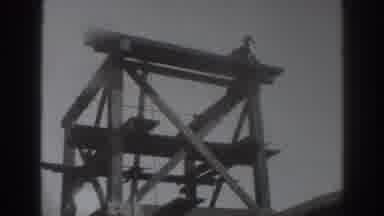 Sacramento California (1937): Man Working On A Construction Site On Top Of A