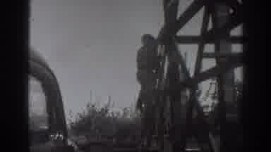 Sacramento California (1937): Man Climbing Down From A High Point Next To An Old