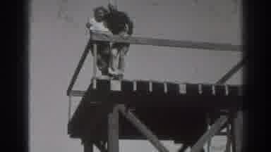 Sacramento California (1937): Man And Woman Together Standing On Top Of A Wooden