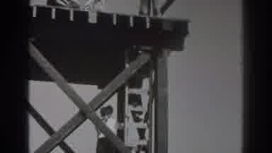 Sacramento California (1937): Three Men Working On Top Of Wooden Tower Platform On