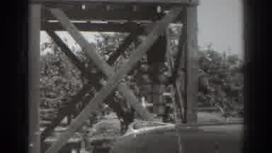 Sacramento California (1937): Woman Wearing A Skirt Descends A Steep Wooden