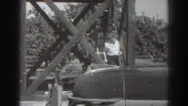Sacramento California (1937): People Are Looking Down On A Lady Getting Ready To