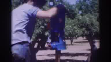 Sacramento California (1937): Two Men Working On Object Repair