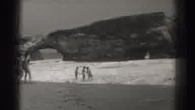 Santa Cruz California (1937): People Play Near Alcove On Beach As The Tide Covers