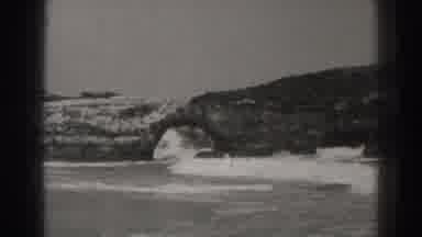 Santa Cruz California (1937): White Capped Waves Crashing Against Rocks Near Sandy