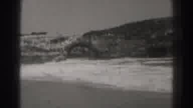 Santa Cruz California (1937): Waves Crashing Onto A Rocky Shore In Black And White