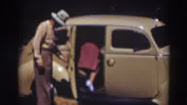 Truckee California (1937): Man Holds Car Door Open For Women To Get In Car Man