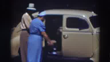Truckee California (1937): Lady In Blue Dress Getting Into The Backseat Of An Old