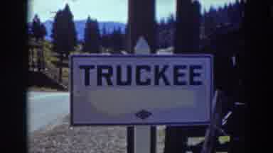 Truckee California (1937): Sign Near The Busy Information Lane For Truckers