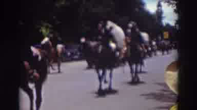Truckee California (1937): People Riding Horses Down The Road