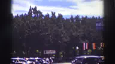 Truckee California (1937): Car Driving Down The Street A Person Riding A Bicycle
