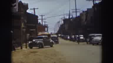 Truckee California (1937): Cars Parked On Busy Street With Telephone Poles
