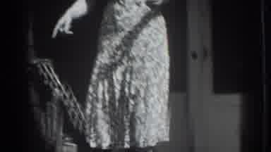 Vacaville California (1937): Daughter Hands Mouse To Mother