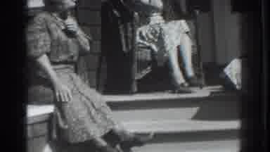 Vacaville California (1937): Woman Sitting In Chair Talks To Woman Sitting On