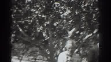 Vacaville California (1937): People Possibly A Family Enjoying Fruit Possibly