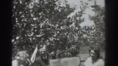 Vacaville California (1937): Vintage Footage Two People Holding And Carrying A