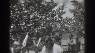 Vacaville California (1937): Man And Woman Laughing While Man Eats Fruit With
