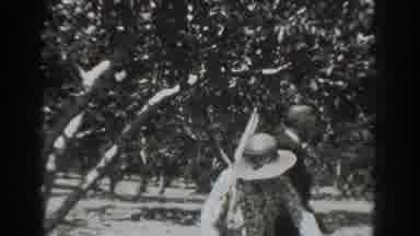 This woman's got a hat to snatch the man's attention!