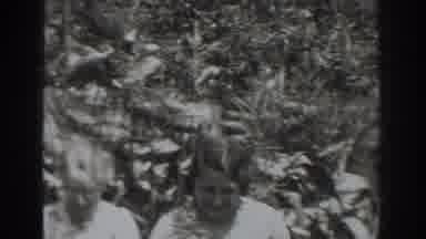 Vacaville California (1937): People On A Happy Plantation And Holding Vegetables