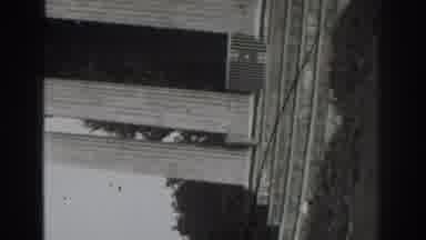 Vacaville California (1937): Woman In Dress On Porch Posing By Rail For Video