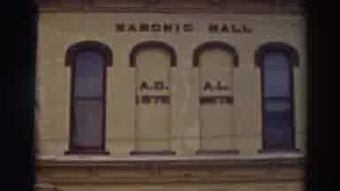 Virginia City California (1937): View Of Red And Yellow Masonic Hall Building On A