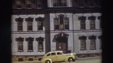 Virginia City California (1937): View Of Yellow Car Parked In Front Of Grey And