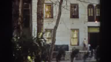 Virginia City California (1937): Three People And Dog In Front Of Large Building