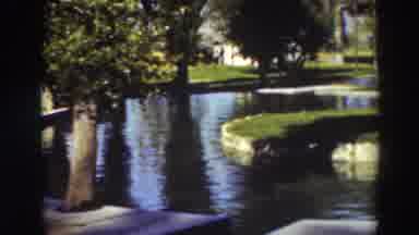 Virginia City California (1937): View Of Green Trees And Reflection Pools On A