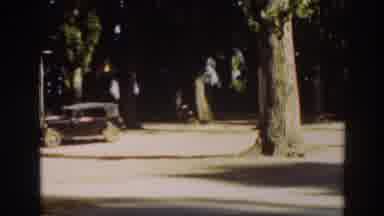 Virginia City California (1937): Black Car Parked Near Large Green Tree On A
