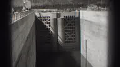 Bonneville Dam Oregon (1938): Footage Of A Floodgate And Men Standing On Top
