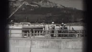Bonneville Dam Oregon (1938): The Men Stand And Looks At The Objects On The Ground