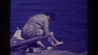 Bucks Lake California (1938): Woman Catches And Cleans Fish Near Body Of Water