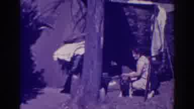 Bucks Lake California (1938): Woman Bathes Her Dog