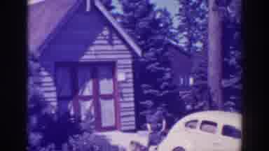 Bucks Lake California (1938): Woman With Dog In Driveway Looking For Something On