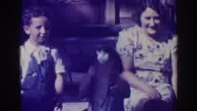 El Dorado City California (1938): Child Holds Fish Up To Camera Next To A Woman