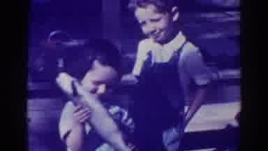 El Dorado City California (1938): A Little Boy And Girl Talking About A Fish