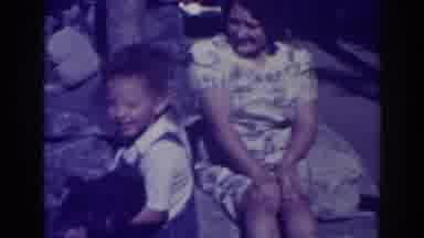 El Dorado City California (1938): Children Show Off Love To Little Puppy With