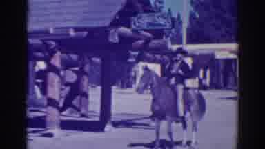 El Dorado City California (1938): Man Wearing Black Hat Sits On Brown Horse On A