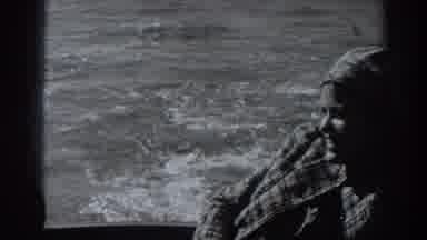 Fort Ross California (1938): Woman Riding On Boat Near Window With Waves Flowing