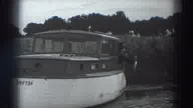 Fort Ross California (1938): People Hanging Out Of A Boat Holding A Fish As The It